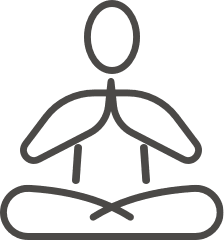 Simple illustration of a person seated in a meditation position.